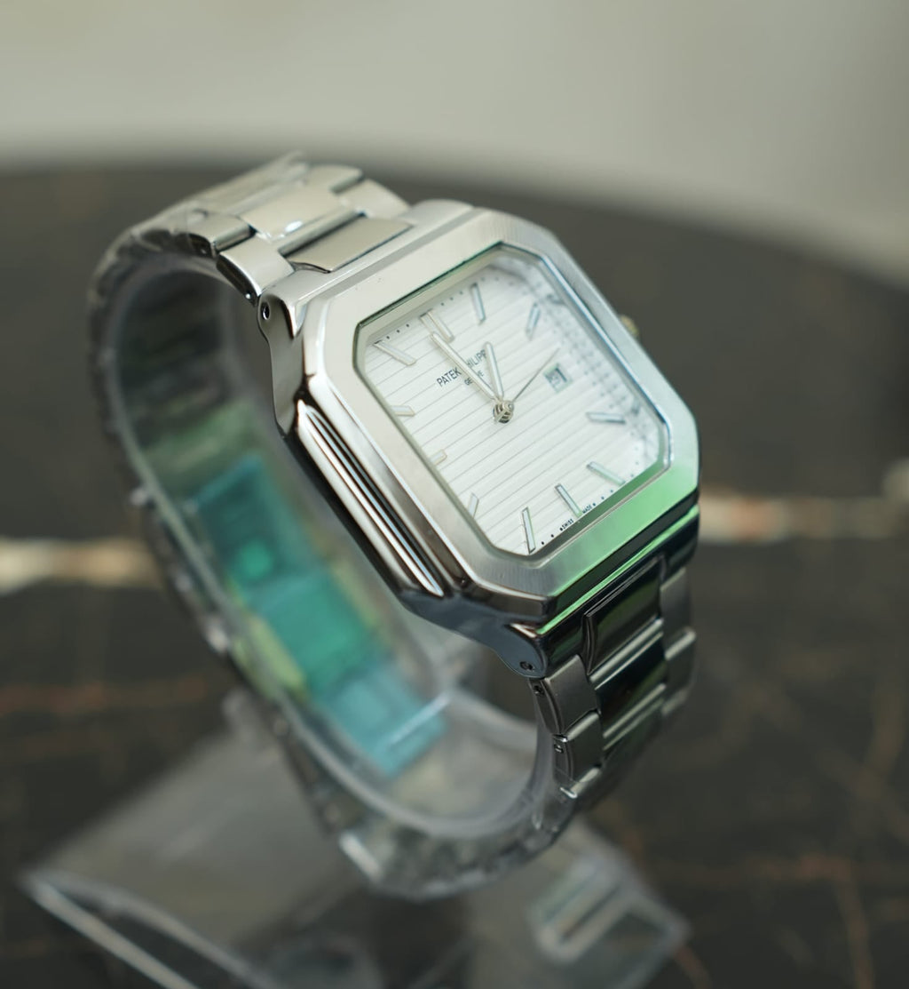 Patek Philippe  - Cubitus silver with white dial