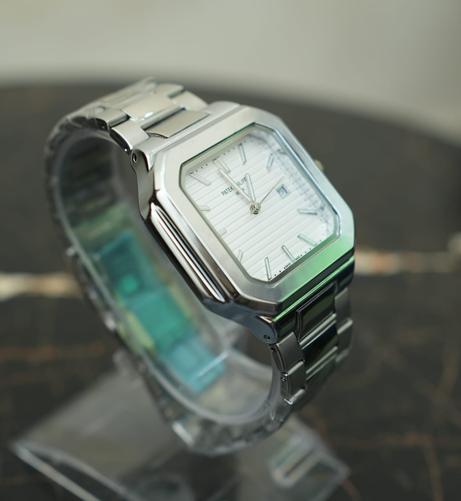 Patek Philippe  - Cubitus silver with white dial