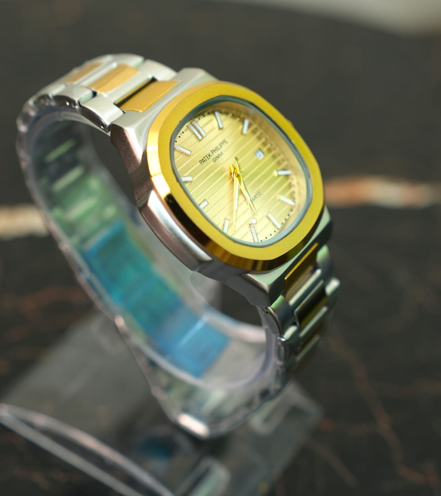 Patek Philippe (PP) - Nautilus Two-Tone with Golden Dial