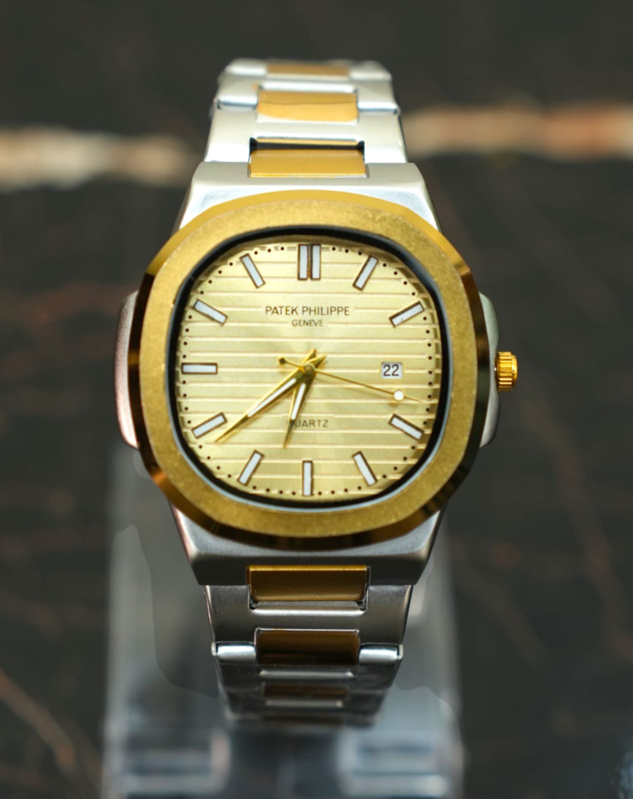 Patek Philippe (PP) - Nautilus Two-Tone with Golden Dial