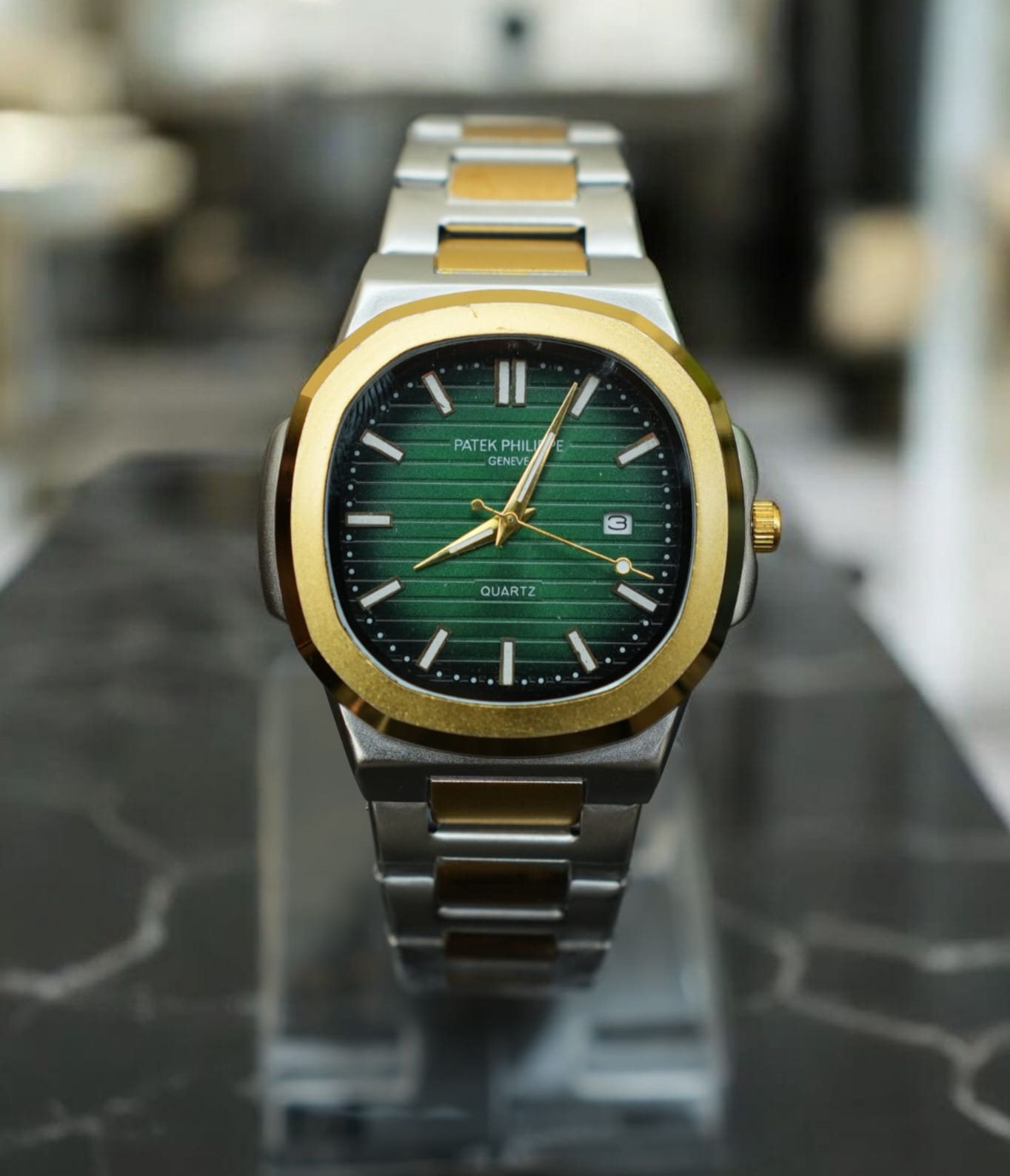 Patek Philippe (PP) - Nautilus Silver & Gold with Green Dial