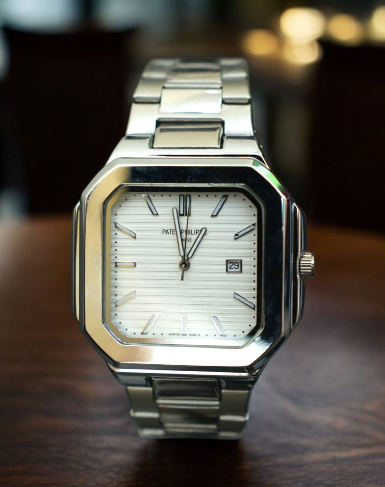 Patek Philippe  - Cubitus silver with white dial